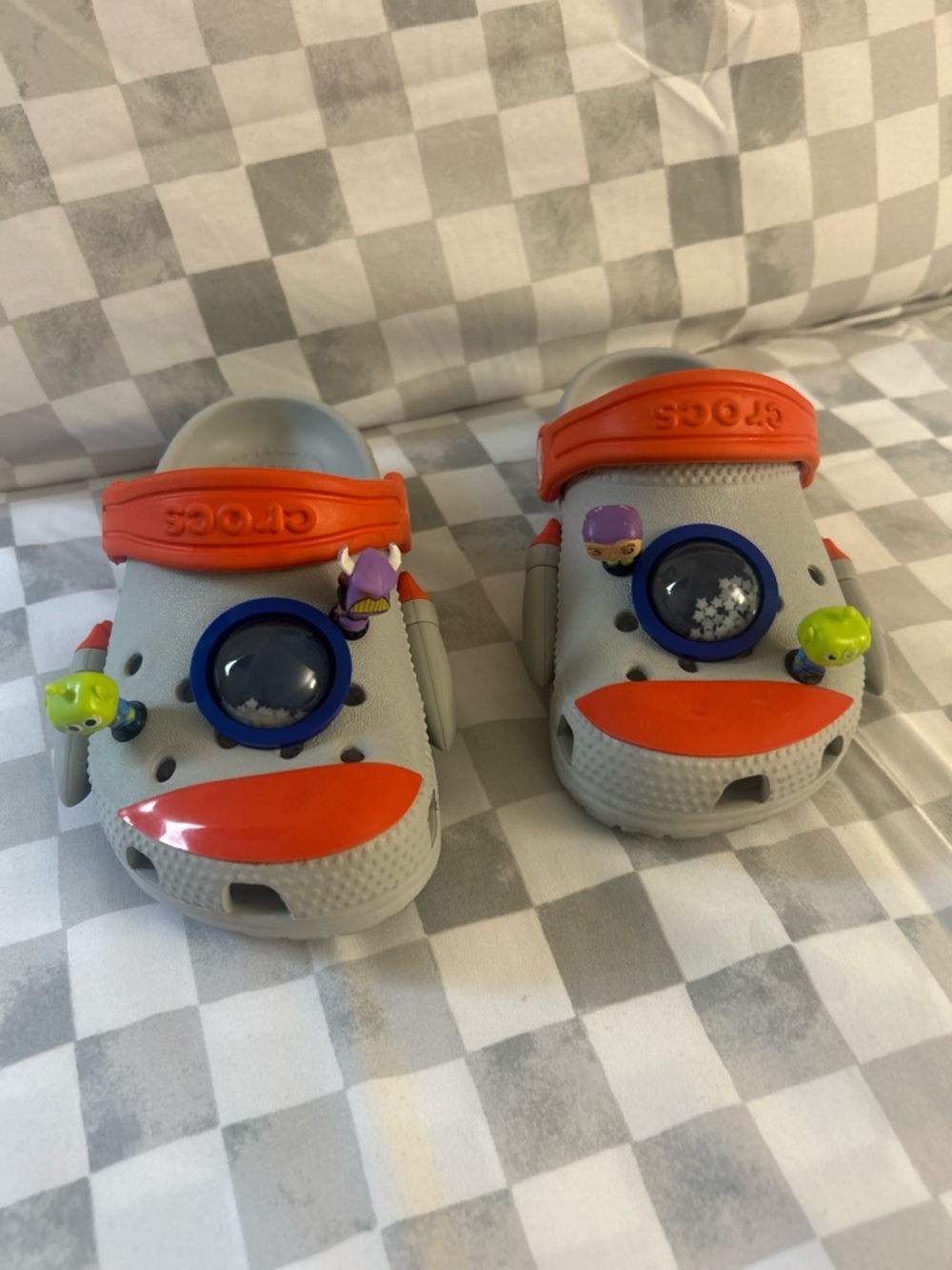 Toddler spaceship CROCS with customized Toy Story character jibbets